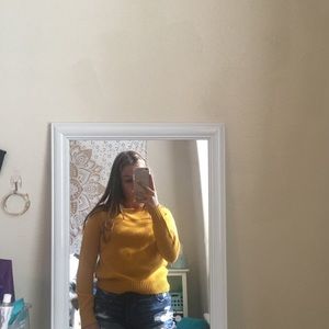 yellow sweater